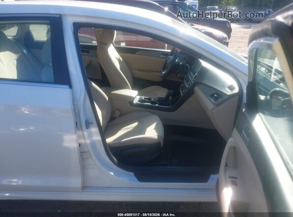 5NPE24AF5KH734956 2019 HYUNDAI SONATA White Вид салону спереду
