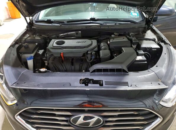 5NPE24AF8JH707300 2018 HYUNDAI SONATA Black Rear interior view