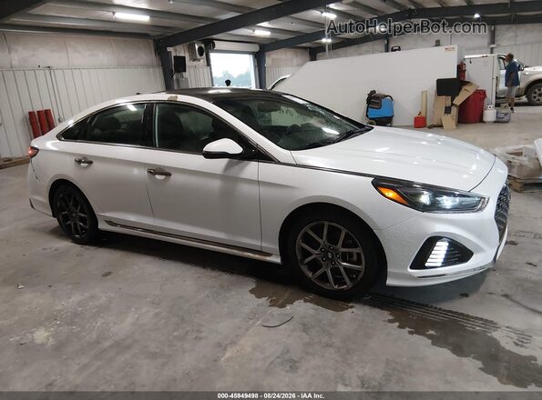 5NPE34AB9KH762575 2019 HYUNDAI SONATA Белый Вид задней части салона