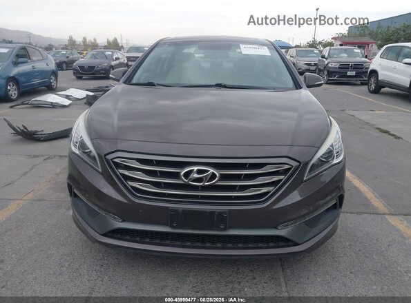 5NPE34AF0HH460720 2017 HYUNDAI SONATA Dark Brown Vista interior trasera