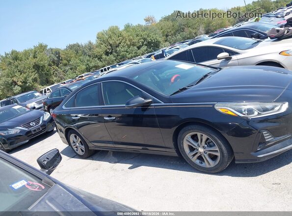 5NPE34AF2JH640805 2018 HYUNDAI SONATA Black Rear interior view