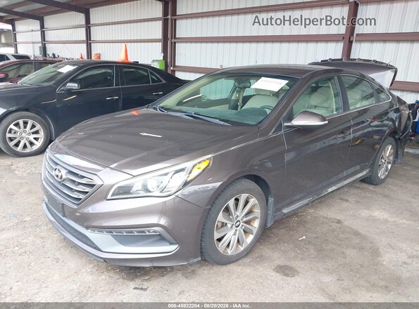 5NPE34AF4GH392047 2016 HYUNDAI SONATA Dark Brown Передняя левая четверть