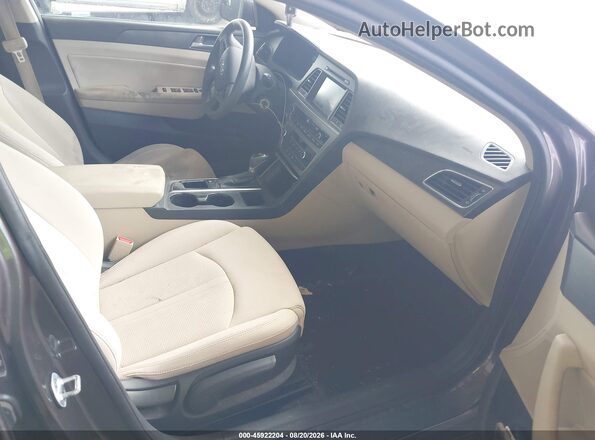 5NPE34AF4GH392047 2016 HYUNDAI SONATA Dark Brown Вид салона спереди