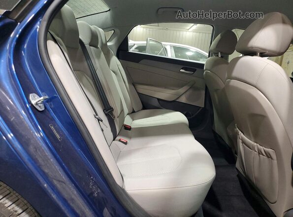 5NPE34AF6JH608049 2018 HYUNDAI SONATA Blue Rear seats view