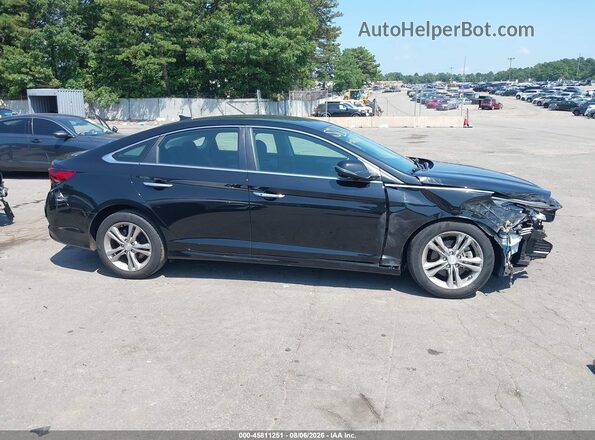 5NPE34AF6KH752329 2019 HYUNDAI SONATA Black Widok wnętrza z tyłu