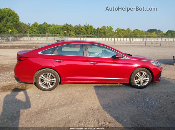 5NPE34AF7JH640864 2018 HYUNDAI SONATA Red Vista interior trasera