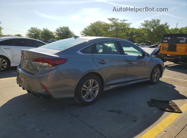 5NPE34AF7JH672827 2018 HYUNDAI SONATA Gray Trasero derecho