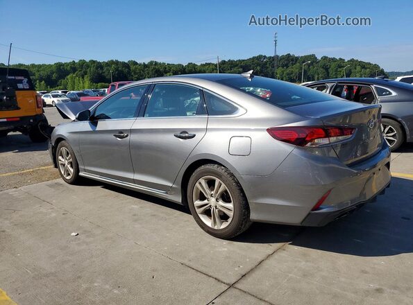 5NPE34AF7JH672827 2018 HYUNDAI SONATA Gray Trasero izquierdo