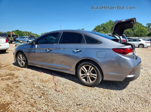 5NPE34AF7JH685027 2018 HYUNDAI SONATA Gray Trasero izquierdo