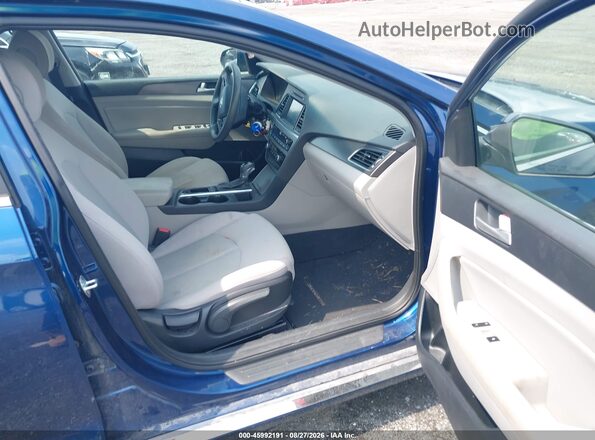 5NPE34AF8GH300163 2016 HYUNDAI SONATA Blue Front interior view