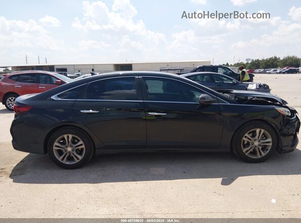 5NPE34AF8JH642977 2018 HYUNDAI SONATA Black Rear interior view
