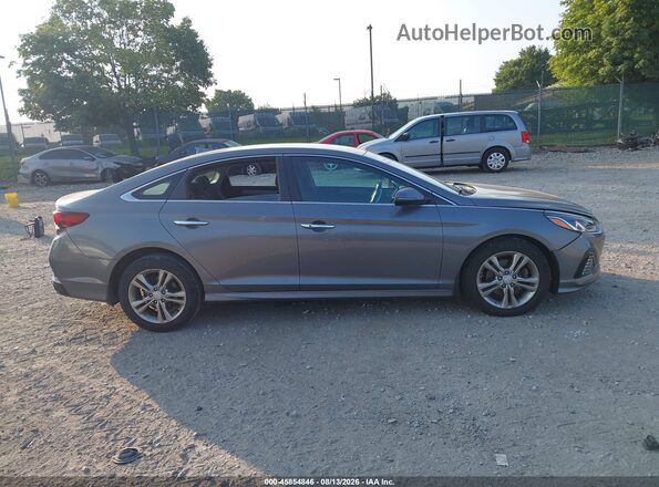 5NPE34AF9KH813639 2019 HYUNDAI SONATA Gray Սալոնի հետևի տեսք