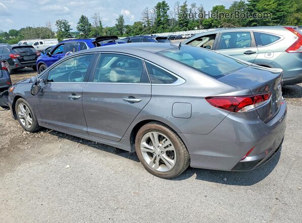 5NPE34AFXJH659067 2018 HYUNDAI SONATA Gray Trasero izquierdo