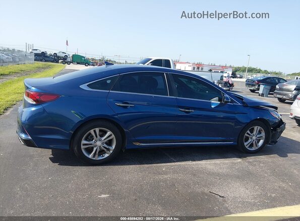 5NPE34AFXKH744301 2019 HYUNDAI SONATA Blue Սալոնի հետևի տեսք