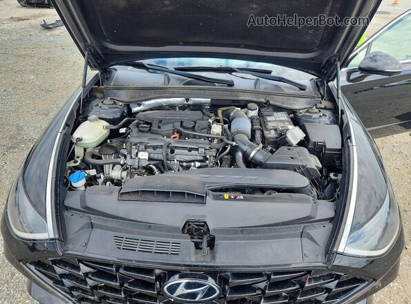 5NPEH4J27MH064437 2021 HYUNDAI SONATA Black Սալոնի հետևի տեսք