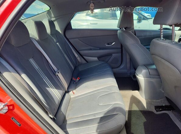 5NPLS4AG6PH108291 2023 HYUNDAI ELANTRA Red Rear seats view