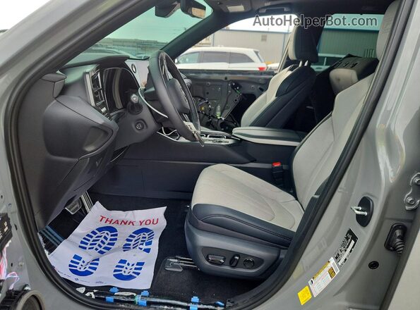 5TDABAB69TS018844 2026 LEXUS TX Gray Widok wnętrza z przodu