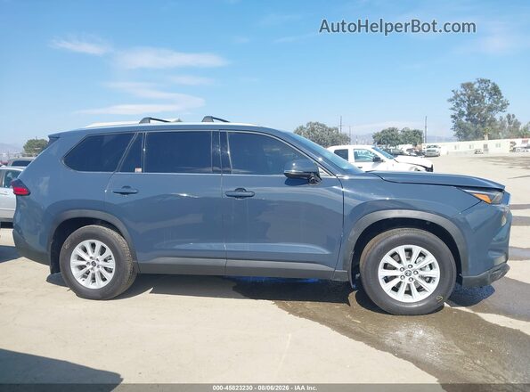 5TDACAB56TS072011 2026 TOYOTA GRAND HIGHLANDER HYBRID Серый Вид задней части салона