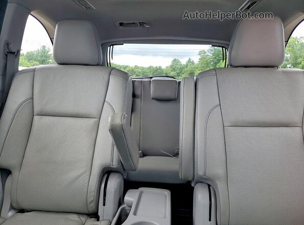 5TDDZRFH3HS478687 2017 TOYOTA HIGHLANDER Blue Vista de los asientos traseros