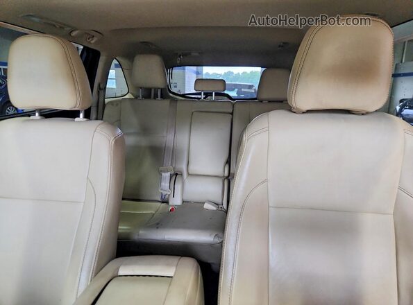 5TDJZRFH1KS701299 2019 TOYOTA HIGHLANDER White Rear seats view