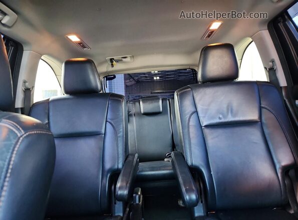 5TDJZRFHXHS399391 2017 TOYOTA HIGHLANDER Black Vista de los asientos traseros