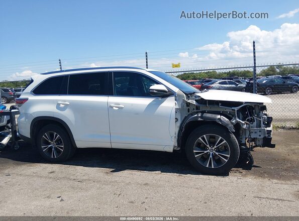5TDKKRFH5GS135535 2016 TOYOTA HIGHLANDER White Rear interior view