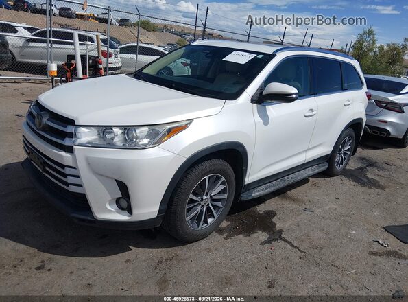 5TDKZRFH4KS309762 2019 TOYOTA HIGHLANDER White Front left