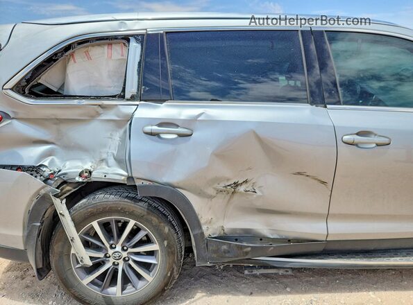 5TDKZRFH7KS321999 2019 TOYOTA HIGHLANDER Silver Widok wnętrza z tyłu