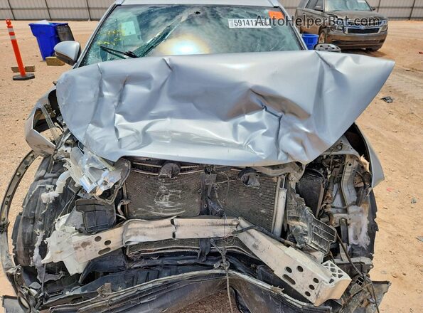 5TDKZRFH7KS321999 2019 TOYOTA HIGHLANDER Silver Widok komory silnika