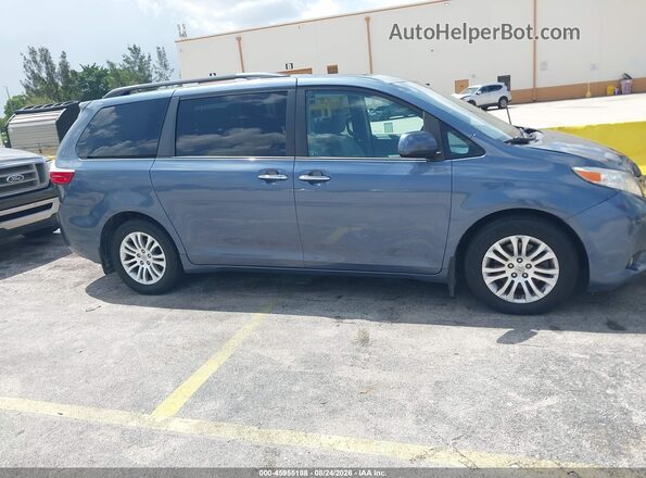 5TDYK3DC6GS744762 2016 TOYOTA SIENNA Blue Rear interior view
