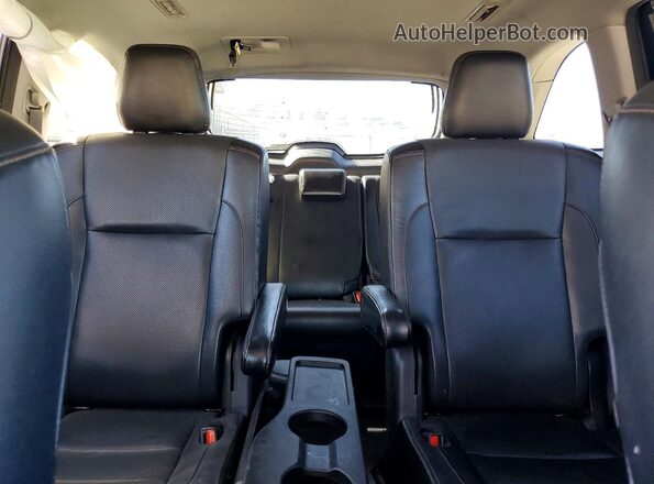 5TDYZRFH8JS279660 2018 TOYOTA HIGHLANDER Brown Vista de los asientos traseros