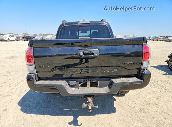 5TFCZ5AN2KX202004 2019 TOYOTA TACOMA Black Rear view