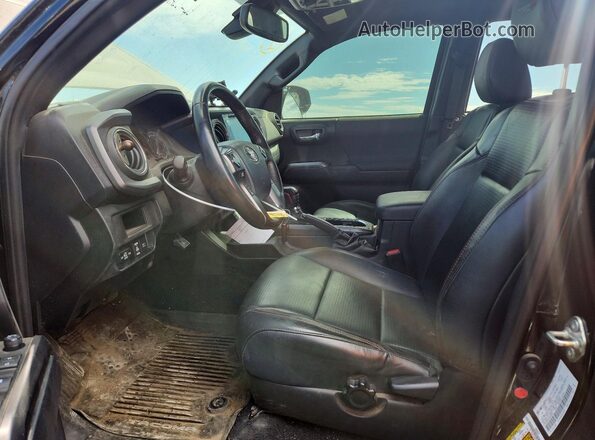 5TFCZ5AN2KX202004 2019 TOYOTA TACOMA Black Front interior view