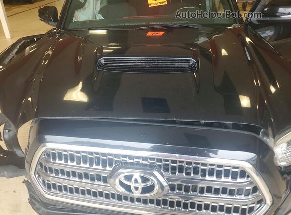 5TFCZ5AN3GX028905 2016 TOYOTA TACOMA Black Вид задньої частини салону