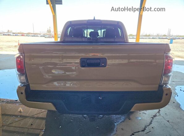 5TFCZ5AN7JX163702 2018 TOYOTA TACOMA Tan Vista trasera