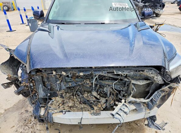 5TFJC5EC7RX006779 2024 TOYOTA TUNDRA Blue Вид задньої частини салону