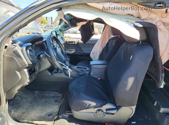 5TFRX5GN9KX143086 2019 TOYOTA TACOMA Серый Вид салона спереди