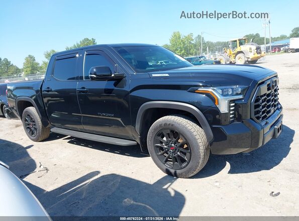 5TFWC5DB6SX111883 2025 TOYOTA TUNDRA HYBRID Black Widok wnętrza z tyłu