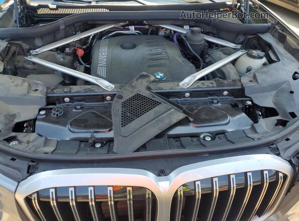 5UX23EM00S9X66931 2025 BMW X7 Gray Vista interior trasera