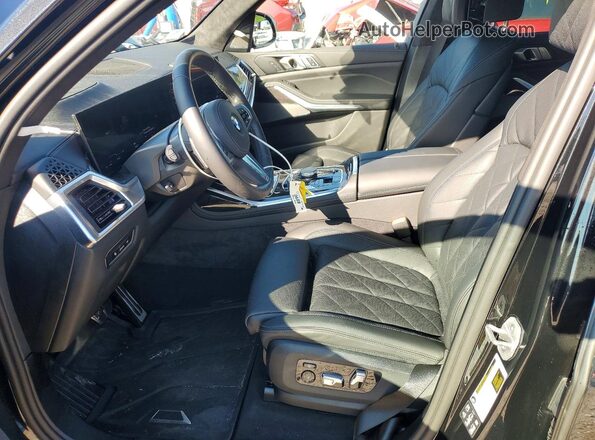 5UX23EM00T9152754 2026 BMW X7 Черный Вид салона спереди