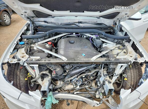 5UX23EM01P9N67636 2023 BMW X7 Белый Вид задней части салона