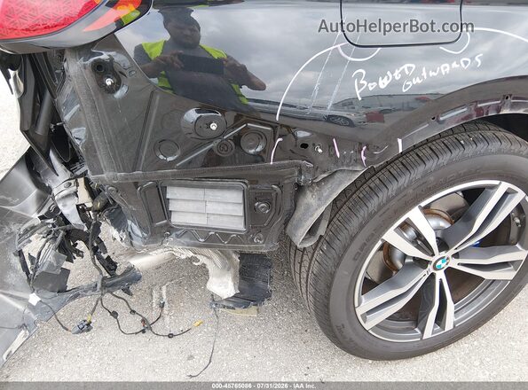 5UX23EM02S9W78303 2025 BMW X7 Black 