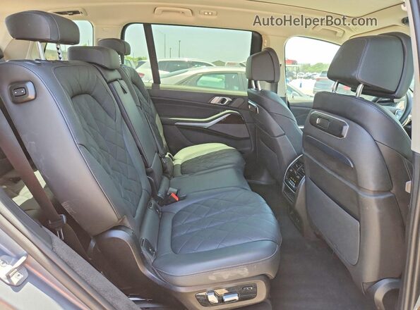 5UX23EM03S9X64946 2025 BMW X7 Silver Rear interior view