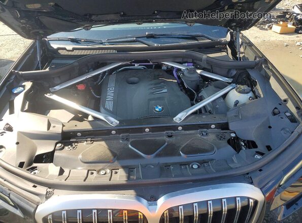 5UX23EM03S9Y33456 2025 BMW X7 Black Widok wnętrza z tyłu