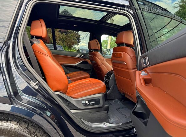 5UX23EM04R9U41824 2024 BMW X7 Blue Rear view