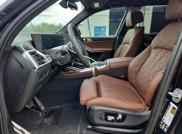 5UX23EM04R9V25108 2024 BMW X7 Синий Вид салона спереди