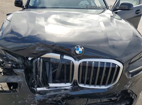 5UX23EM04T9186860 2026 BMW X7 Black Widok wnętrza z tyłu