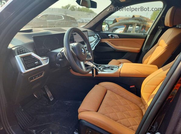 5UX23EM05T9420293 2026 BMW X7 Black Вид салону спереду