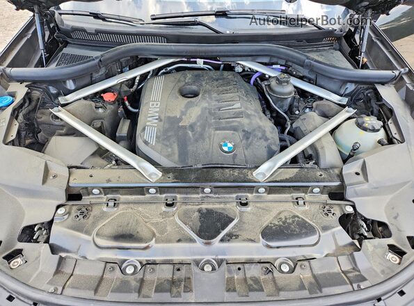 5UX23EM09R9U24274 2024 BMW X7 Black Սալոնի հետևի տեսք