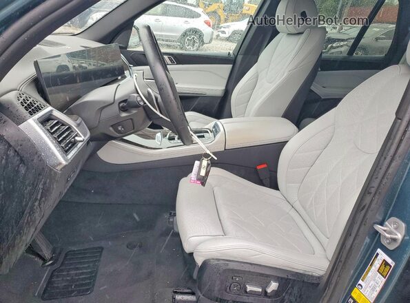 5UX23EU02R9S36275 2024 BMW X5 Синий Вид салона спереди